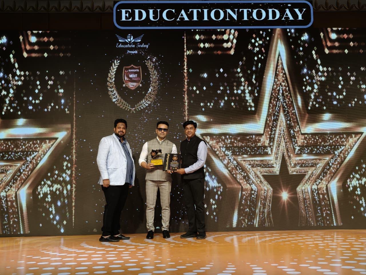 Presidency School and Presidency Indo International School receiving their Education Today Survey 2026 recognition on stage at the Maharashtra School Merit Awards